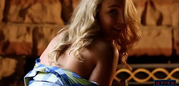  Young blonde hottie Zoey Taylor gives a hot striptease